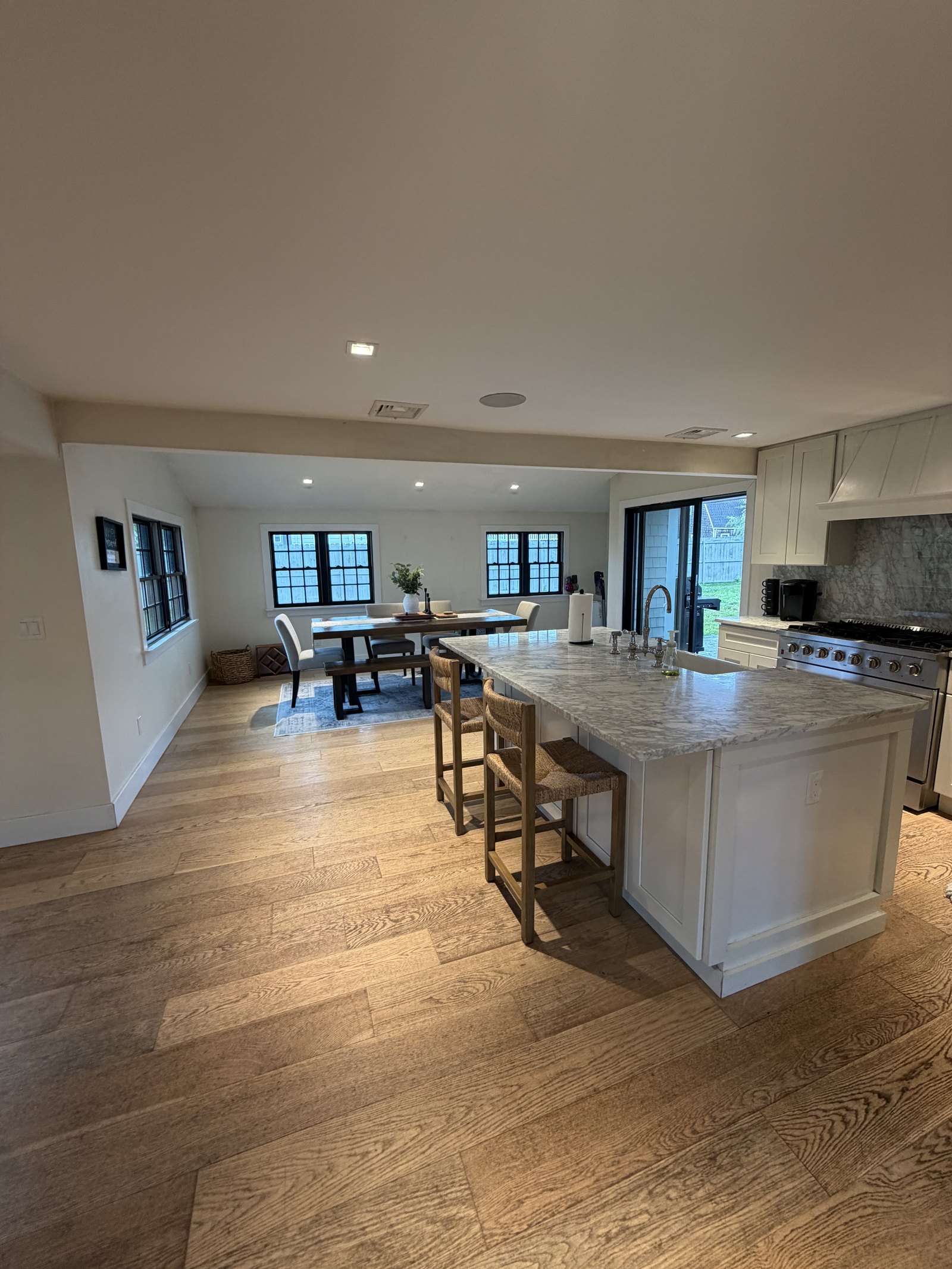 Spotless open-plan kitchen with polished island after a Gomes Cleaning visit