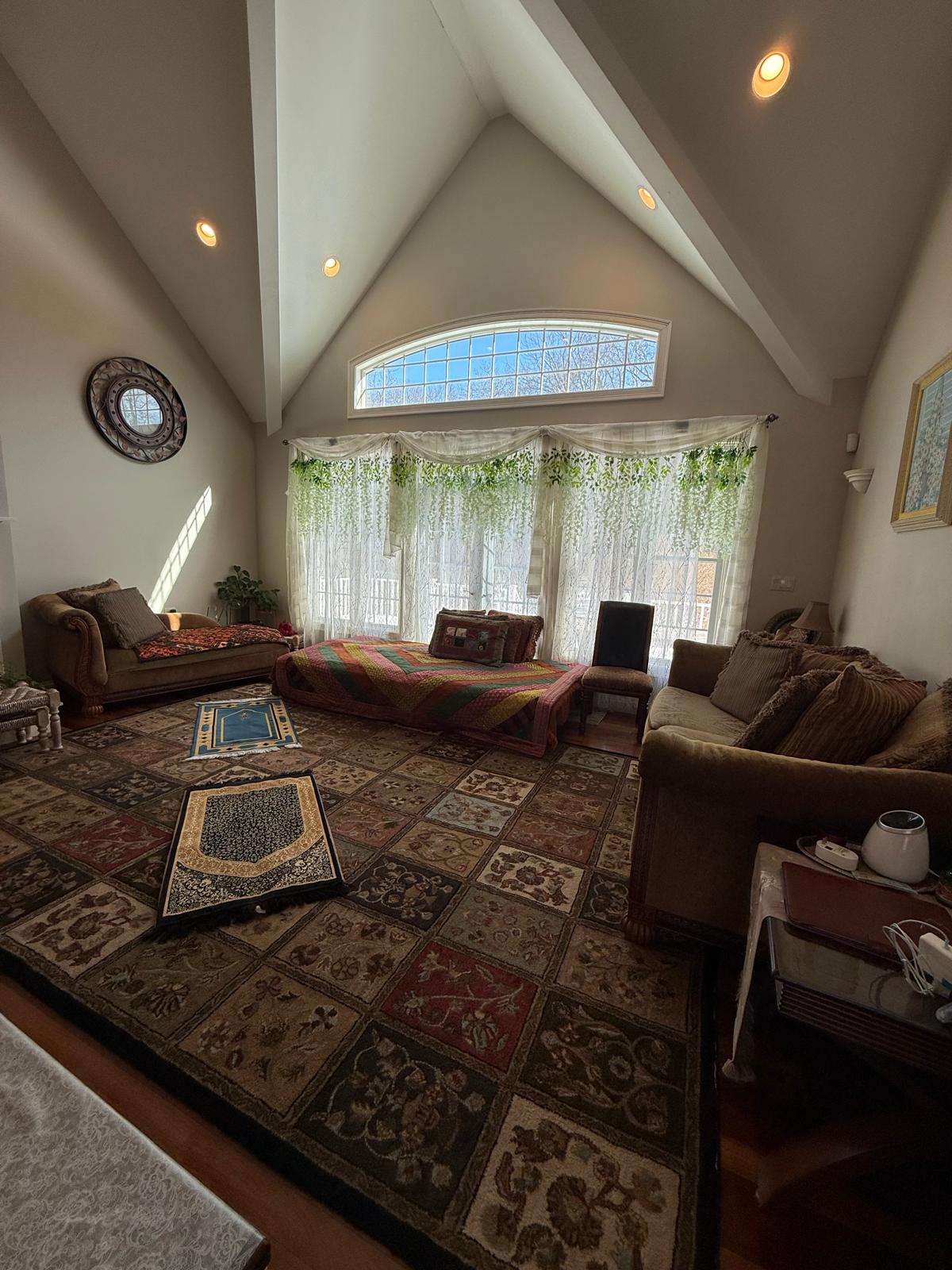Bright vaulted living room cleaned by the Gomes Cleaning team